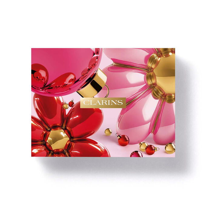 Clarins floral eco designed gift box packaging featuring red flowers for a replenishing mature skin routine set care.