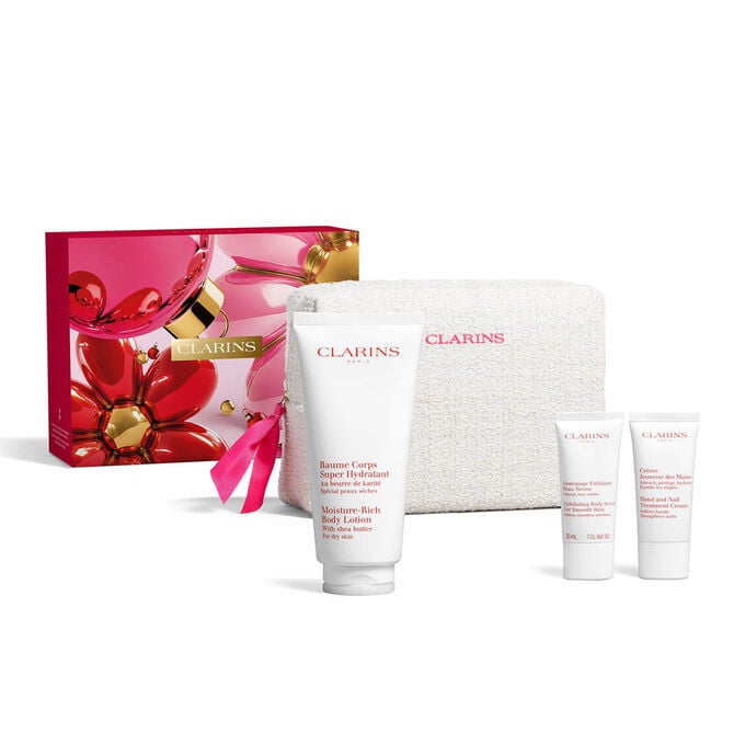 Hydrating body care gift set featuring full size body lotion body scrub and hand cream inside a floral cosmetic pouch.