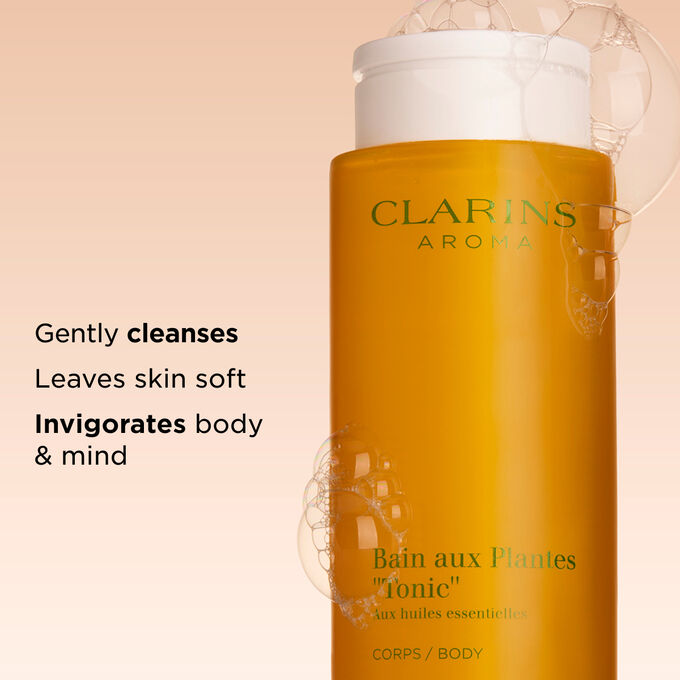 Packshot of Clarins Tonic Bath and Shower Concentrate with text emphasising it is a fragrant plant-based shower gel.