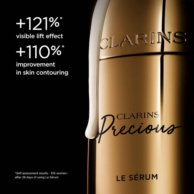Packshot of Clarins Precious Serum on dark background, with text emphasising its power to lift and improve skin contour.