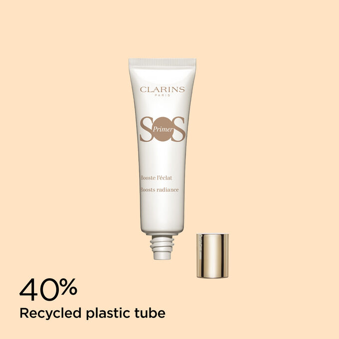 Packshot of SOS Primer White by Clarins with text emphasising its packaging is made of 40% recycled plastic.