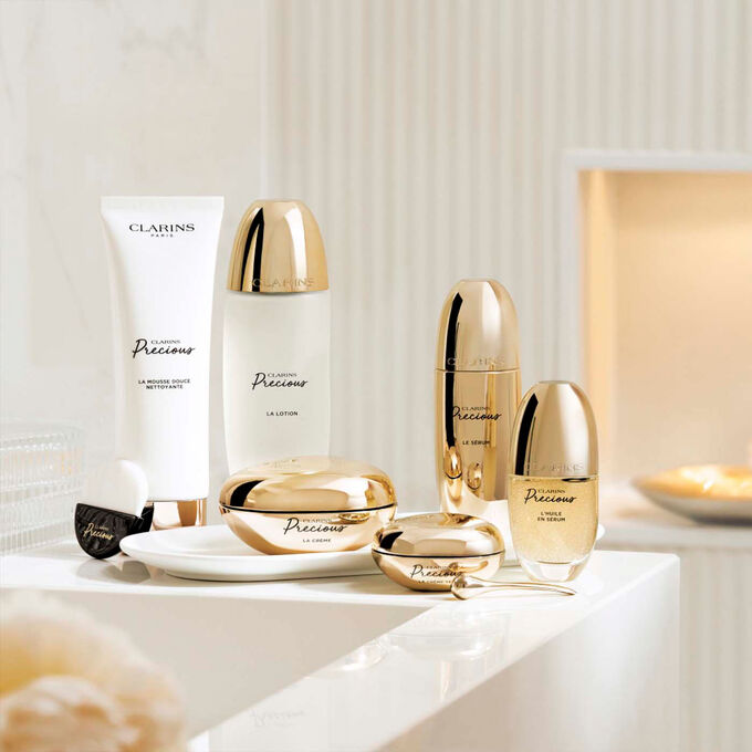 Packshot of Clarins Precious Luxury skincare range with Moonlight flower cryoextract as the main ingredient.